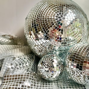 A gorgeous accent to your glamorous party - these mirrored foam core disco balls are lighter weight and perfect to hang for your disco party, bachelorette party, birthday or New Year's Eve bash!