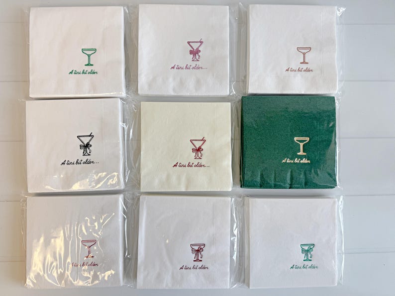 Celebrate a milestone in style with these charming A Tini Bit Older Martini Cocktail Napkins, the perfect addition to any martini-themed birthday party or sophisticated gathering. Designed for lovers of elegant cocktails, these foil-stamped napkins feature a chic illustration of a classic coup martini glass wrapped with a delicate bow around the stem, adding a playful yet refined touch to your celebration. These are perfect for any age birthday, give them as gift for the martini lover.