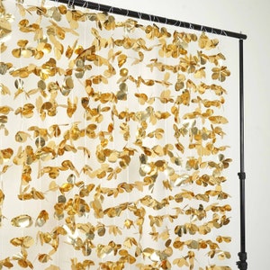 This 'Gold Flower Curtain' will have everyone in the party spirit. Guests will love using this as a backdrop to their photos - memories to treasure forever. The perfect photo booth background!