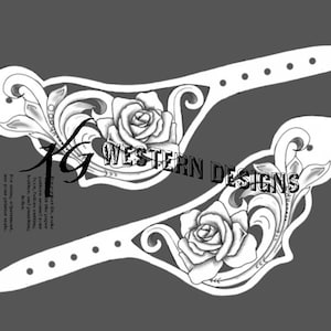 May include: Two white leather spur straps with floral and rose designs. The straps have a series of holes for adjustment and the text "WESTERN DESIGNS". The design is a detailed illustration, perfect for Western-themed crafts.