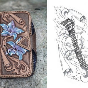 May include: A brown leather phone case with a tooled design of two blue flowers and scrolls. The case has the text "KG Western Designs" on the side.