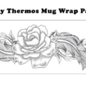 May include: A black and white line drawing of a rose with leaves and swirls. The drawing is labeled "Stanley Thermos Mug Wrap Pattern".