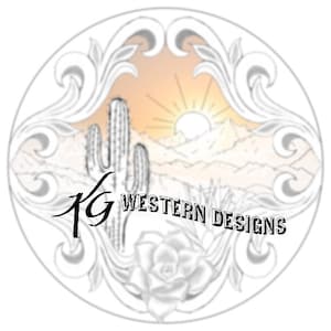 May include: Black and white illustration of a desert landscape with a cactus, mountains, and a sun rising over the horizon. The illustration is framed by a decorative border and includes the text "KG Western Designs".
