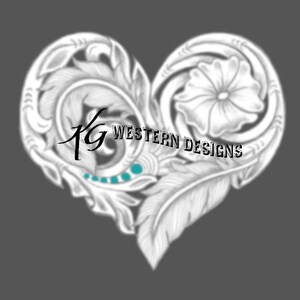 May include: A white leather heart-shaped design with a floral pattern and turquoise accents. The design includes the text "KG WESTERN DESIGNS".