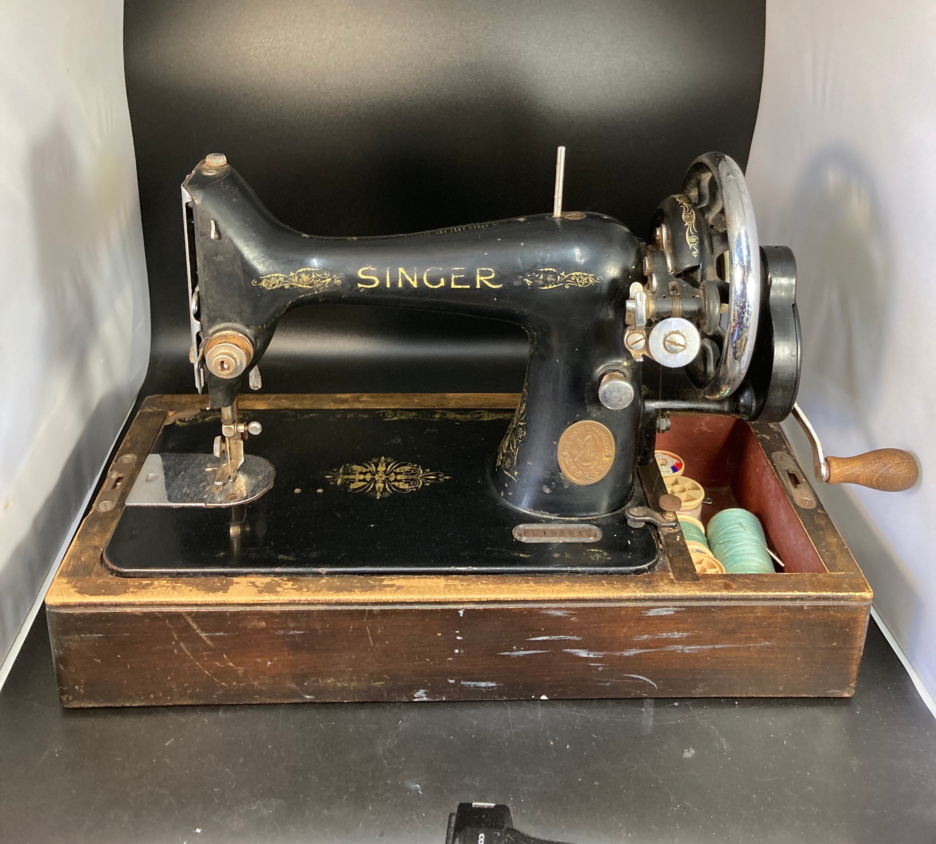 value of old singer sewing machine in wood case