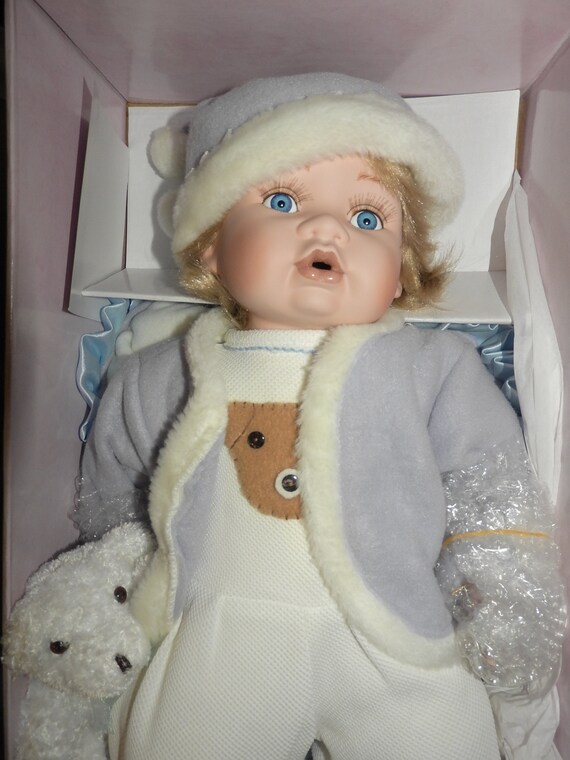 The leonardo collection porcelain baby best sale doll