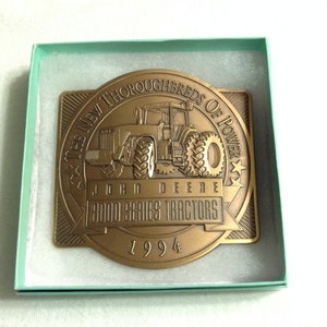 John Deere belt buckle, 1994, &#39;The New Thoroughbreds of Power&#39; 8000 Series Tractors, solid brass, limited edition 283 of 2250.