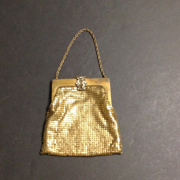 Whiting & Davis gold tone metal mesh evening bag, rhinestone closure (8 rhinestones missing), chain handle,, golden lining, mid-century.