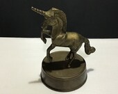 Brass unicorn on stand, non-magnetic, was once top to a music box, now works as figurine, vintage 1970s.