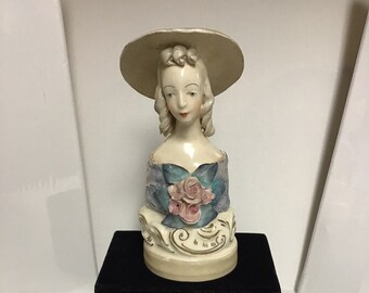 Midcentury vintage Cordey porcelain bust of a lady in a hat, #5030, some age and use related damage.