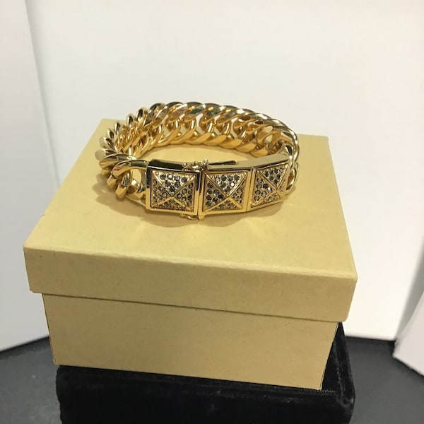 Vintage signed Rebecca Minkoff gold-plated chain bracelet, rhinestone studded pyramids on fastener area, magnetic closure with side locks.