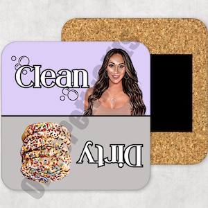 May include: A set of two magnetic dish towels with a cork backing. One side says "Clean" and features a woman with long brown hair. The other side says "Dirty" and features a stack of colorful sprinkle-covered cookies.