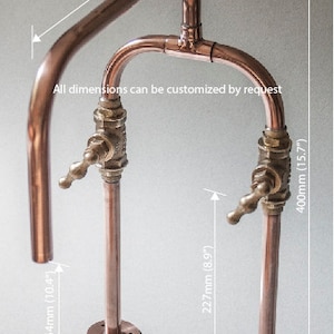 Biped is a deck mount industrial style handmade copper pipe tap made by Switchrange