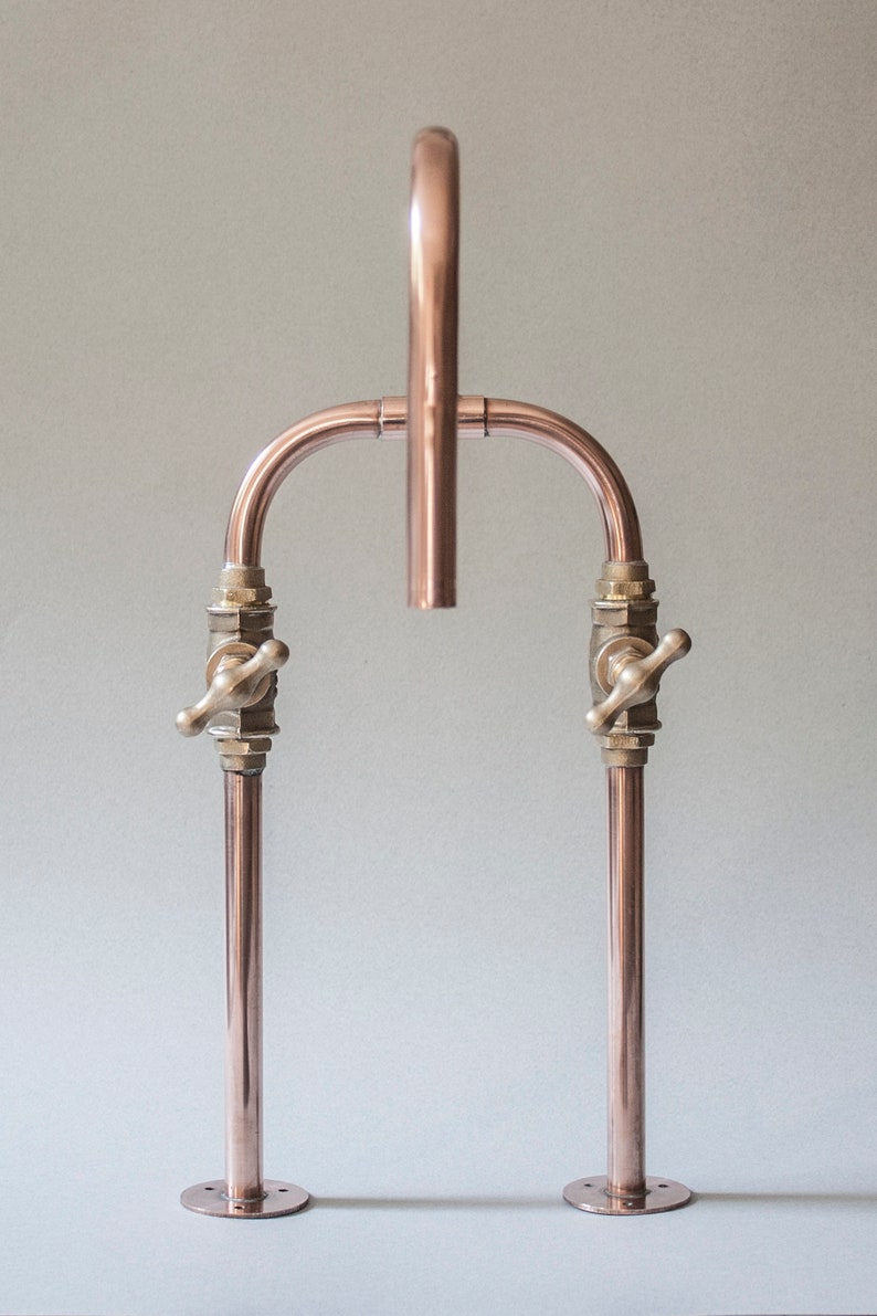 Biped is a deck mount industrial style handmade copper pipe tap made by Switchrange