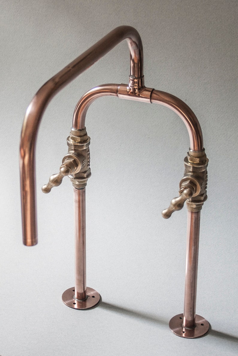 Biped is a deck mount industrial style handmade copper pipe tap made by Switchrange