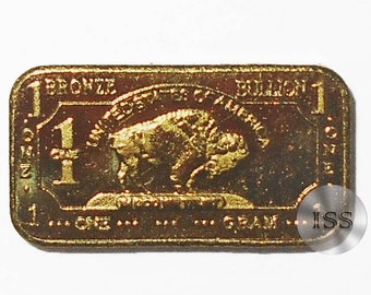 Lingot de bronze fin .999, pur lingot de bison/buffle d'un gramme, faisant partie d'une série unique de collection 1 g Dimensions 15 mm x 8 mm Métaux élémentaires