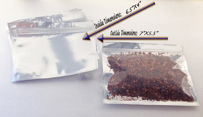 May include: Two clear plastic bags with a zipper closure. The bag on the left is empty and the bag on the right contains a brown powder. The text on the image reads "Inside Dimensions: 6.5"x4" and "Outside Dimensions: 7"x5.5""