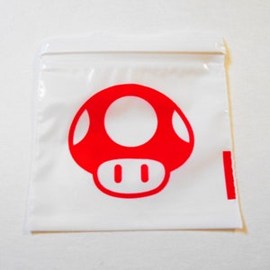 Pacote com 100 - Sacos de cogumelo 1-Up vermelhos, saco de poliéster branco fosco resselável com zíper e selo de 2 "x 2" polegadas, nível acima, saco de plástico com zíper para joias 2020