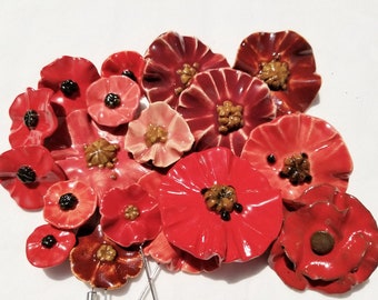 handmade poppy pins for memorial day, pottery flowers, ceramic pins, poppy pins, pottery poppies, veterans day, ceramic jewelry, pottery pin