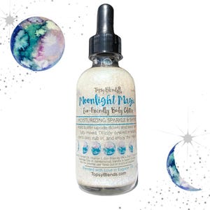 May include: A clear glass bottle with a silver glitter liquid inside. The bottle has a black dropper top and a white label with the text "Topsy Blends Moonlight Magic Eco-Friendly Body Glitter Moisturizing Sparkle & Shine Hold bottle upside down and swirl until fully mixed. Drizzle desired amount onto skin, rub in, and enjoy the magic! Sweet Almond Oil, Vitamin E, Eco-Friendly Mica, Pure Essential Oils of Sandalwood, Vanilla & Summer Orange. Not for internal use. Keep out of reach of children. Blended with Love in Eugene, OR TopsyBlends.com".