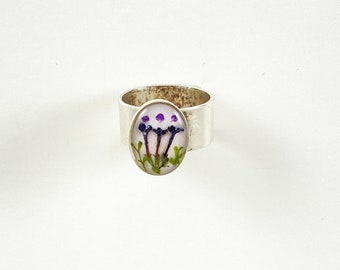 Classic silver ring with three dotted purple flowers and fern on creamy resin background adjustable flower lover gift for her or him