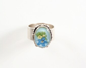 Forget-me-not ring elderflower fern on pale blue resin background ornate silver adjustable ring flower lover gift botanics in resin