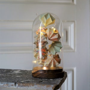 Garland of diamonds in origami under glass bell for interior decoration, terracotta green-gray blue duck yellow mustard