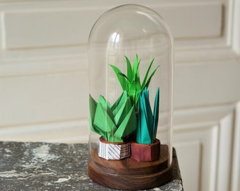 Origami cactus garden under glass bell for interior decoration, vegetation and nature