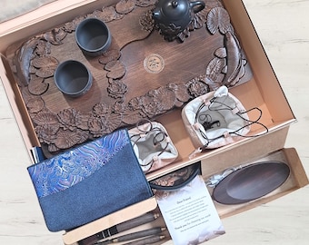 Gift set for tea ceremony. Teaware and tea tray for gongfu. Yixing teapot, tea bowl, tea scale, tea party tools in a luxury gift box.