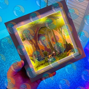 POJAWIŁ SIĘ DZIKI „EEVEE” - Sprite'y w dziczy - Dodaj swojego(ich) sprite'a(ów)! - Personalizowany prezent w postaci pikselowej sztuki z papieru w kształcie pudełka z cieniem Pokemon 3D