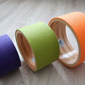ECO Yoga wheel set 8&quot;, 10&quot;, 12&quot;. Wooden yoga wheel. Wheel covered with purple, olive, orange yoga mat. Wooden circle