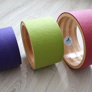 ECO Yoga wheel set 8&quot;, 10&quot;,12&quot;. Wooden yoga wheel. Wheel covered with purple, olive, red yoga mat.Wooden circle