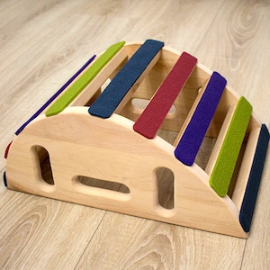 ECO Back bender. Wooden yoga back bender. Back bender covered with purple, olive, red, blue yoga mat.