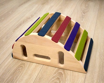 ECO Back bender. Wooden yoga back bender. Back bender covered with purple, olive, red, blue yoga mat.