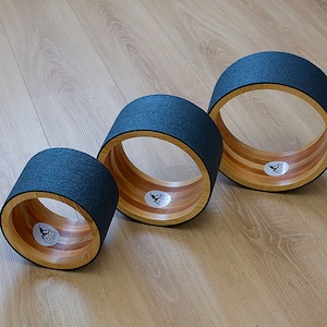 ECO Yoga wheel set 8&quot;, 10&quot;,12&quot;. Wooden yoga wheel. Wheel covered with blue yoga mat. Wooden circle