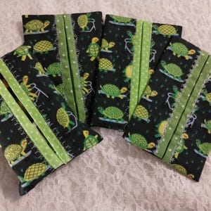 May include: A set of three ceramic mugs with a speckled, matte finish. Each mug features a different color: light blue, cream, and gray. The mugs have a simple, modern design and a comfortable handle. Perfect for coffee or tea.