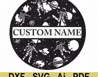 May include: A black and white circular design featuring astronauts floating in space with planets and stars. The text "CUSTOM NAME" is in a white rectangular box. Below, the text reads "DXF - SVG - Ai - PDF instant Download".