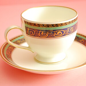 Vintage Japanese withe, blue and green porcelain tea cup and saucer with gold trim,  made in Japan. Antique tea Cup Maple Romance China