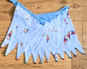 Beatrix Potter Peter Rabbit Christmas pale blue festive fabric bunting | Double-sided | 12 flags | approx 3 metres