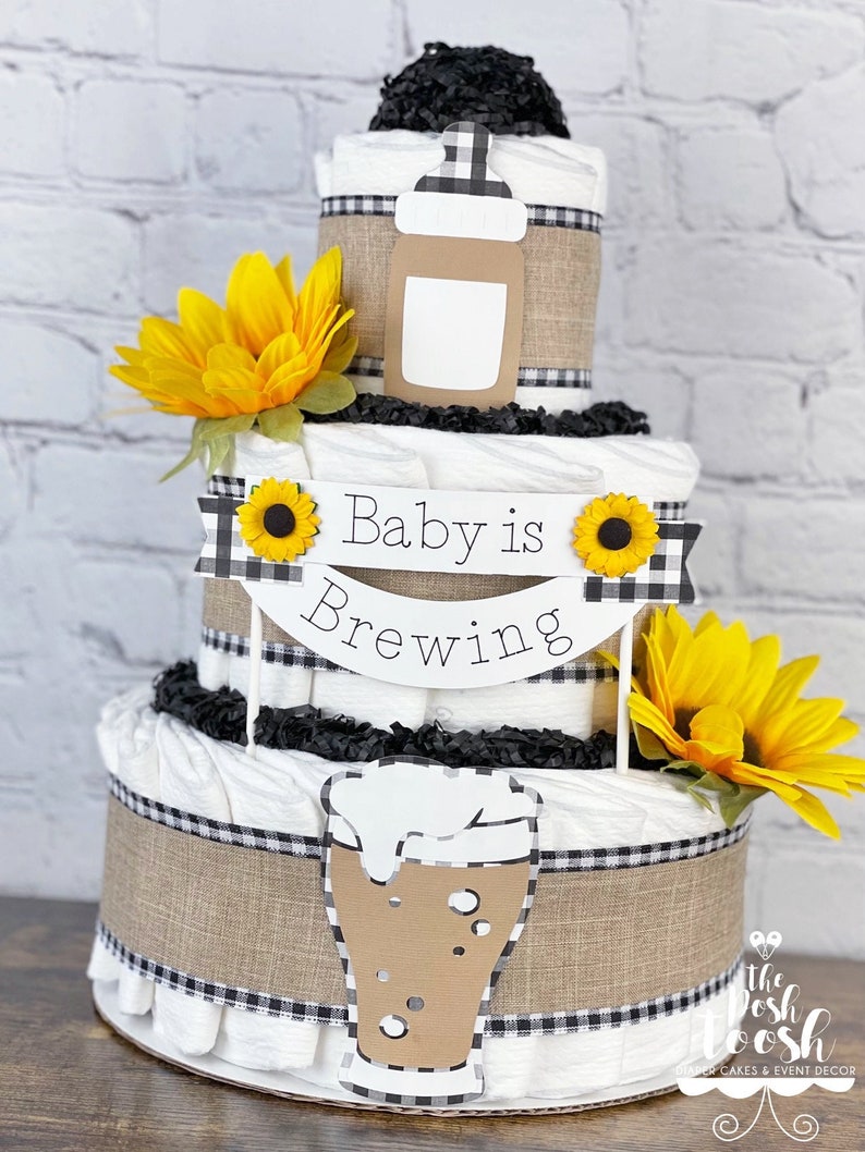 baby is brewing diaper cake with rustic burlap and sunflowers
