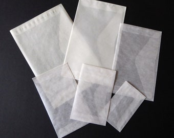 24 Glassine envelopes, mixed pack, bulk lot