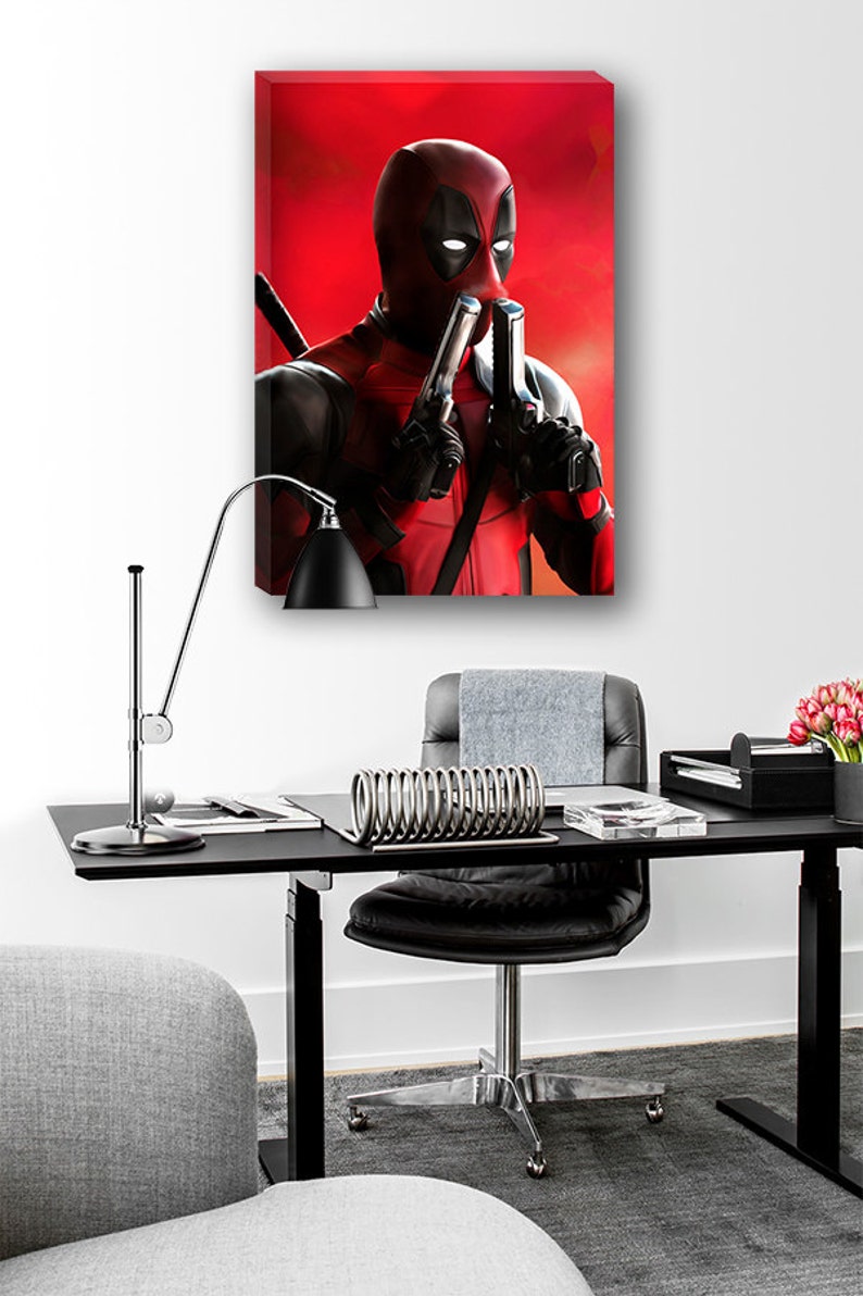 May include: A red and black superhero character with a mask and two guns, standing against a red background.