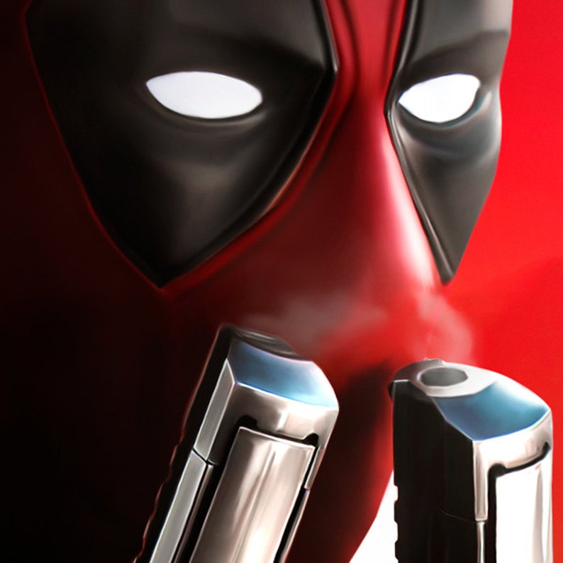 May include: Close-up of a red and black Deadpool mask with two silver metal objects attached to the bottom. The mask has white eyes and a black mouth.