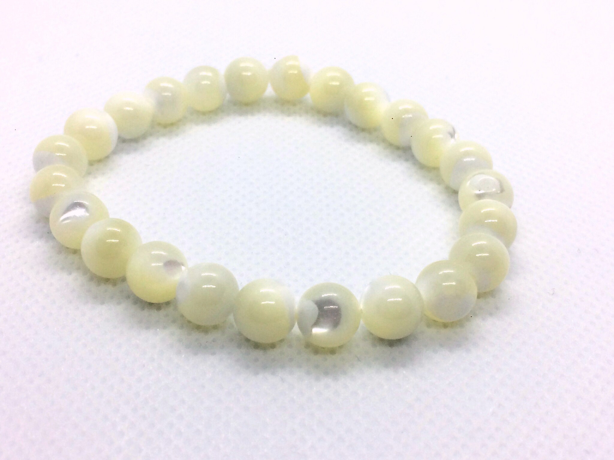 Buy gemstone factory 8mm Snow Mother of pearl bracelet, mother of pearl  bead bracelet, white mother of pearl, mother of pearl stones, mother of  pearl gemstone at