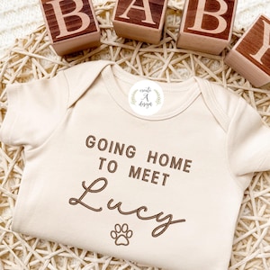 Going home to meet  Embroidered Dog Name Onesie® Protected By Dog Name, Pregnancy Announcement Personalized Gifts for Newborn, Dog custom