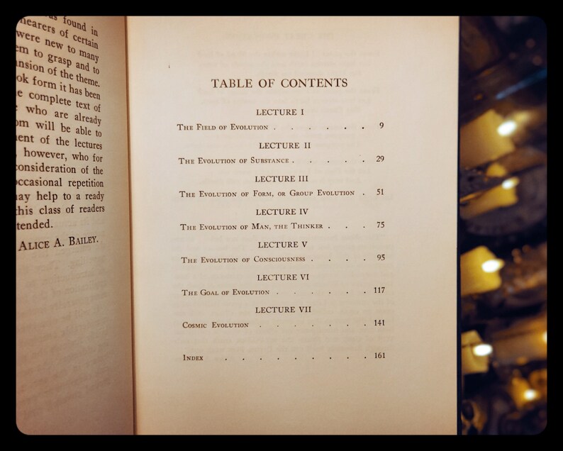 May include: A black and white book with the title "Table of Contents" and a list of chapters with page numbers. The chapters include "The Field of Evolution", "The Evolution of Substance", "The Evolution of Form, or Group Evolution", "The Evolution of Man, The Thinker", "The Evolution of Consciousness", "The Goal of Evolution", and "Cosmic Evolution".