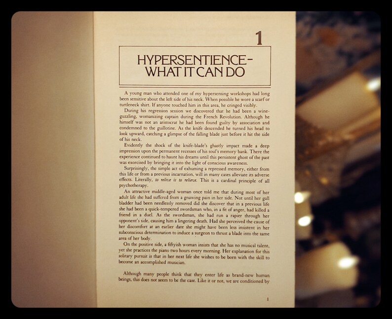 May include: A book with the title "Hypersentience - What It Can Do" and the number "1" on the top right corner. The book is open to a page with text about hypersensitivity and how it can affect people's lives.