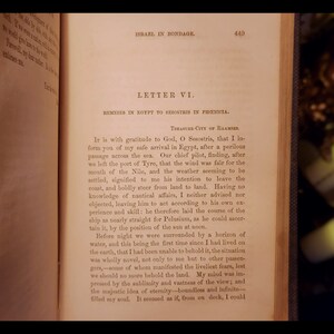 May include: A page from a book titled "Israel in Bondage" with the text "Letter VI. Remeses in Egypt to Sesostris in Phoenicia." The text describes the author's journey by sea to Egypt.