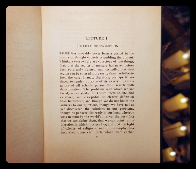May include: A page from a book titled "Lecture I: The Field of Evolution". The text discusses the history of thought and the evolution of mystery. The page number is 11.