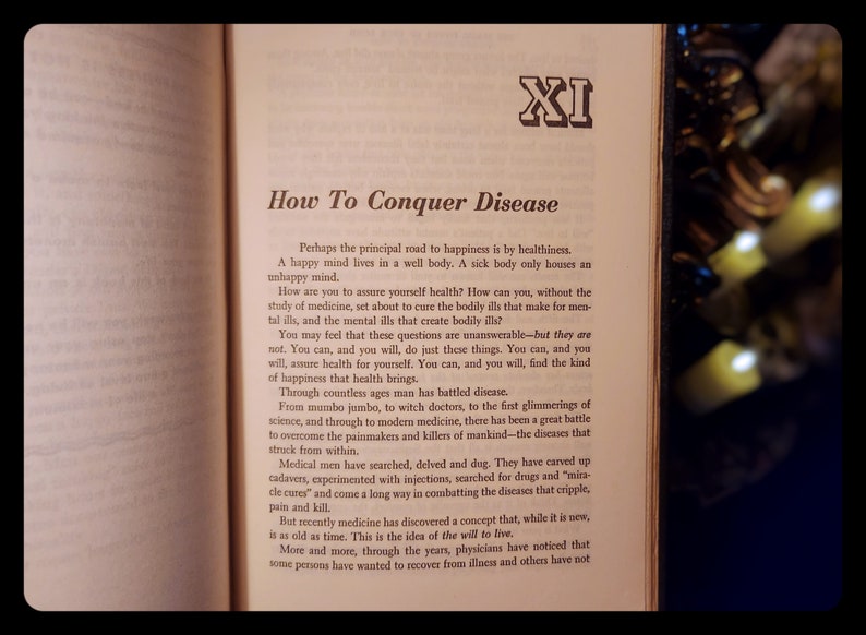May include: A page from a book titled "How To Conquer Disease" with the text "Perhaps the principal road to happiness is by healthiness. A happy mind lives in a well body. A sick body only houses an unhappy mind."